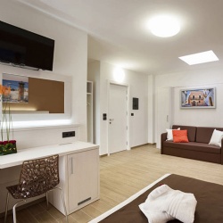 hotel furniture in contemporary wood and fabric finishes