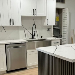 kitchen wood cabinetry and quartz countertop