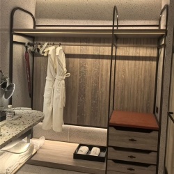 open style closet for hotel guestroom